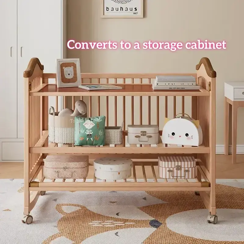 Convertible baby crib repurposed as a three-tier nursery storage shelf displaying storage boxes and plush toys.