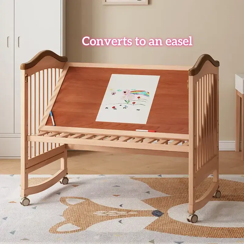 Solid wood convertible crib transformed into an adjustable tilt drawing easel for kids art and painting.