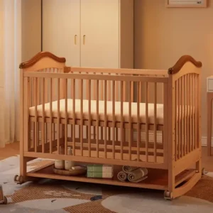 Multi-functional natural wood baby crib and rocking cradle with under-bed storage shelf in a cozy nursery room.