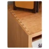 manna-cherry-wood-cube-bookcase-dovetail-joint-detail Close-up detail of traditional dovetail mortise and tenon joinery on top corner of Manna cherry wood modular bookcase.