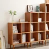 manna-cherry-wood-open-cube-bookcase-series-side-angle Side angle view of Manna cherry wood 4-cube, 6-cube, and 8-cube bookcases arranged in a stepped layout.