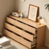 manna-oak-9-drawer-dresser-open-drawers-storage High angle view of Manna oak 9-drawer wide chest of drawers with open drawers showing spacious interior storage capacity.
