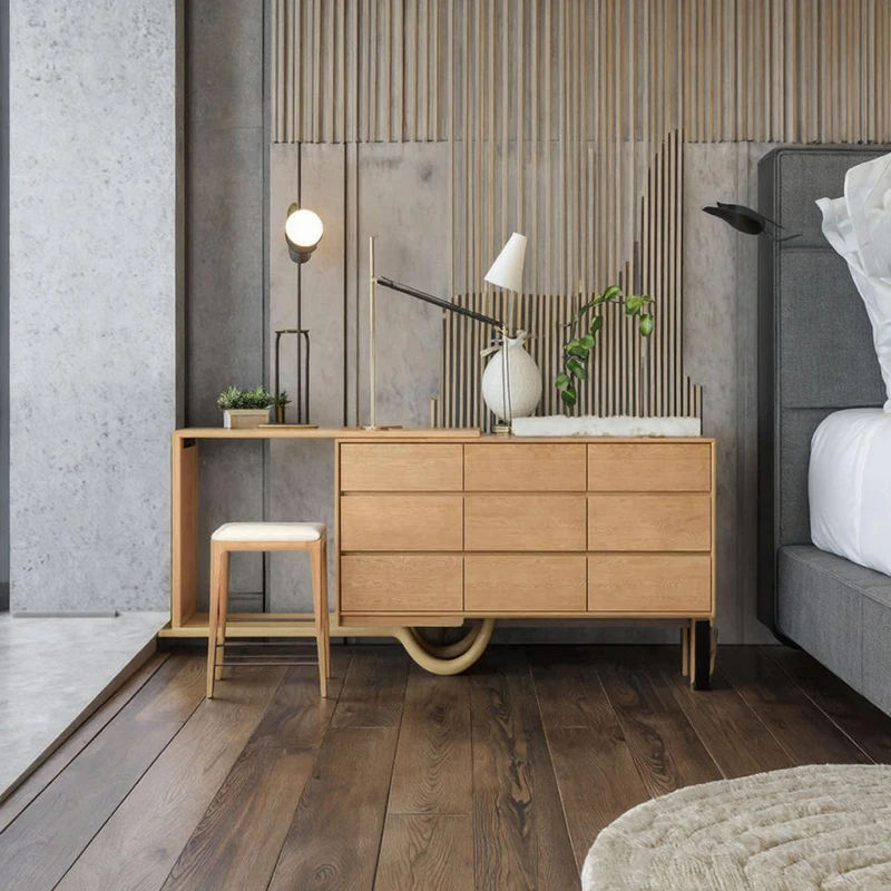 Manna oak 9-drawer dresser integrated with a retractable vanity table desk styled in a minimalist bedroom.