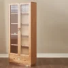 Front view of Manna oak double door fluted glass bookcase with numbered feature callouts for glass doors, shelves, drawer, and base.