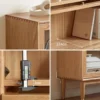 manna-oak-glass-door-bookcase-craftsmanship-details Craftsmanship details of Manna oak bookcase showing dovetail joints, 27.4cm shelf depth, 2cm solid wood board thickness, and tapered legs.
