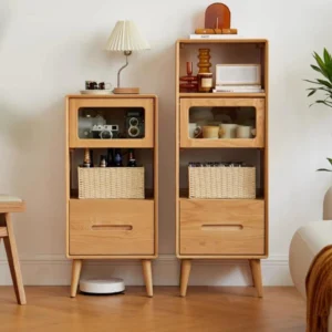 manna-oak-narrow-accent-cabinets-two-heights-comparison Side-by-side comparison of Manna oak narrow accent cabinets in medium and tall heights with glass flip doors and drawers.