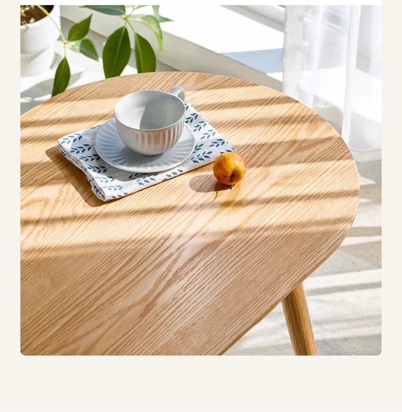 manna oak oval tabletop sunlight detail