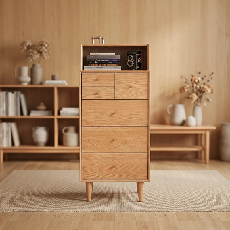 manna-oak-tall-dresser-open-hutch-front-view Front view of Manna oak tall chest of drawers with top open shelf, featuring asymmetrical top small drawers and tapered legs.