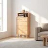 manna-oak-tall-dresser-open-hutch-sofa-sideboard Manna oak tall dresser chest of drawers with open shelf placed next to a modern sofa in a warm living room.
