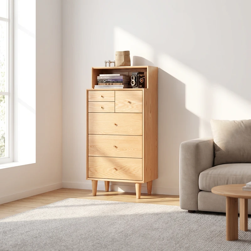 manna-oak-tall-dresser-open-hutch-sofa-sideboard Manna oak tall dresser chest of drawers with open shelf placed next to a modern sofa in a warm living room.