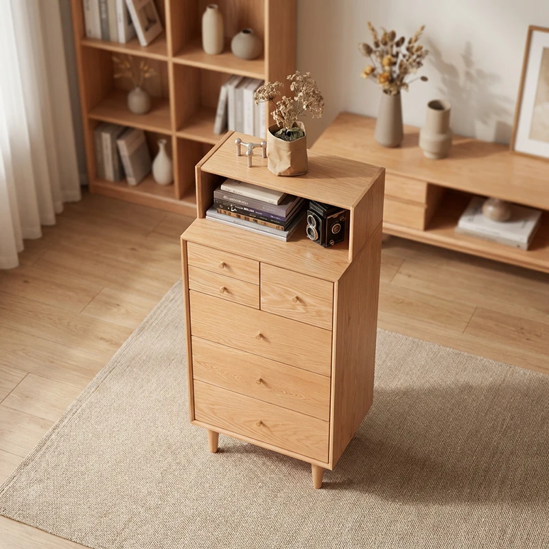 High angle view of Manna oak tall dresser with top open hutch holding books, vintage camera, and decorative items.