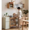 manna-oak-wall-mounted-fluted-glass-cabinet-dining-room Manna oak wall-mounted fluted glass cabinet styled above a wooden sideboard credenza in a dining room.