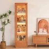 manna-turin-cherry-wood-glass-display-cabinet-front-view Front view of Manna Turin cherry wood glass display cabinet featuring four tier illuminated storage for figures and wine bottles.