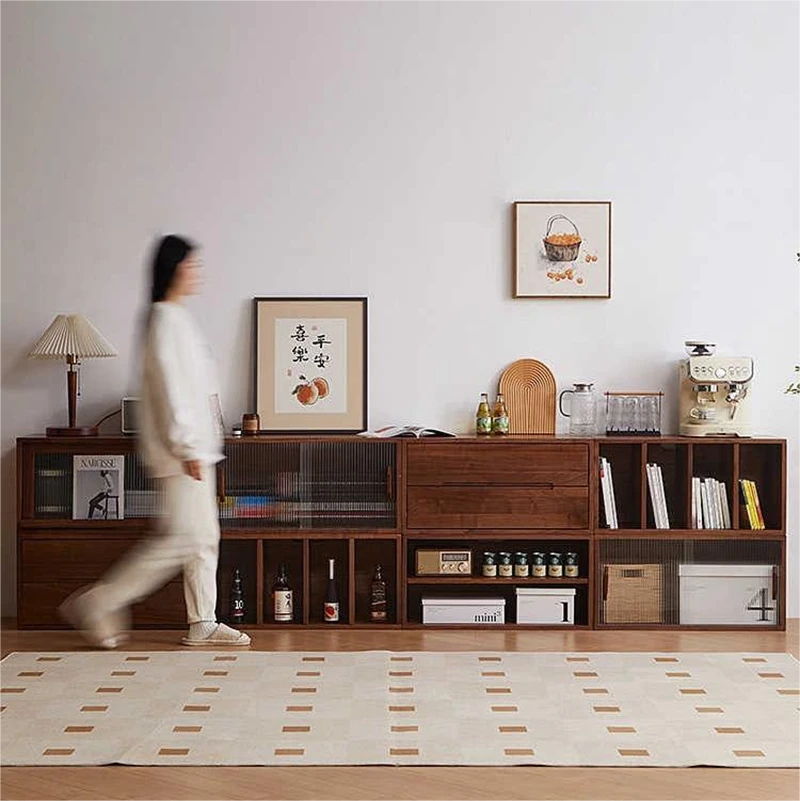 Manna black walnut modular sideboard credenza units combined along a wall in a contemporary living room.