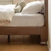 solid-black-walnut-platform-bed-frame-master-bedroom Modern minimalist solid black walnut platform bed frame with headboard in an aesthetic master bedroom.