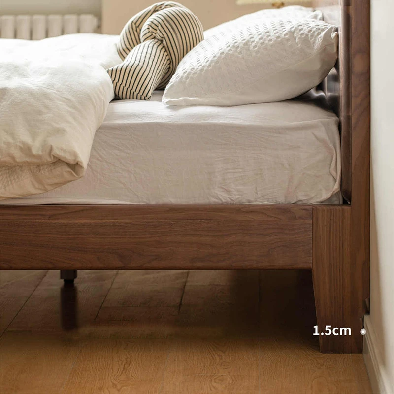 solid-black-walnut-platform-bed-frame-master-bedroom Modern minimalist solid black walnut platform bed frame with headboard in an aesthetic master bedroom.
