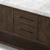 Close-up of solid wood center vanity drawers with textured wood grain and vintage bronze bar handles.