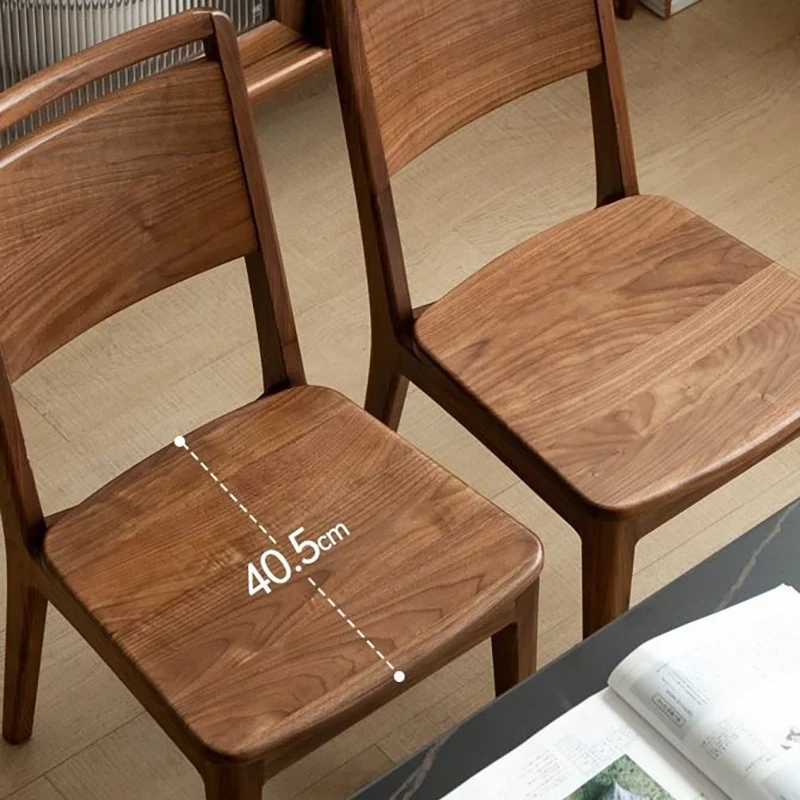 manna-black-walnut-dining-chair-seat-dimensions High angle view of two black walnut dining chair seats showing a 40.5cm seat width dimension overlay.