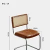 Side view size guide of a cane back cantilever dining chair with a tufted brown leather seat and chrome sled base.