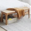 manna-oak-dining-bench-bedroom-size-guide Oak bench at the foot of a bed with a mustard throw and a forty five centimetre height marker showing seat height.