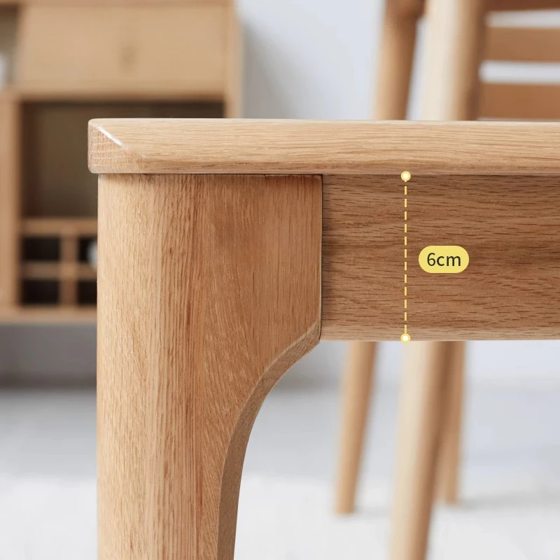 manna-oak-dining-bench-leg-detail Detail shot of an oak bench leg joint with a curved bracket and a six centimetre apron height dimension label.