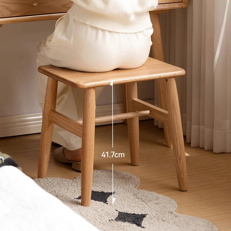 manna-oak-square-stool-height Solid oak square stool used at a dressing table with a height overlay marking 41.7cm from floor to seat.