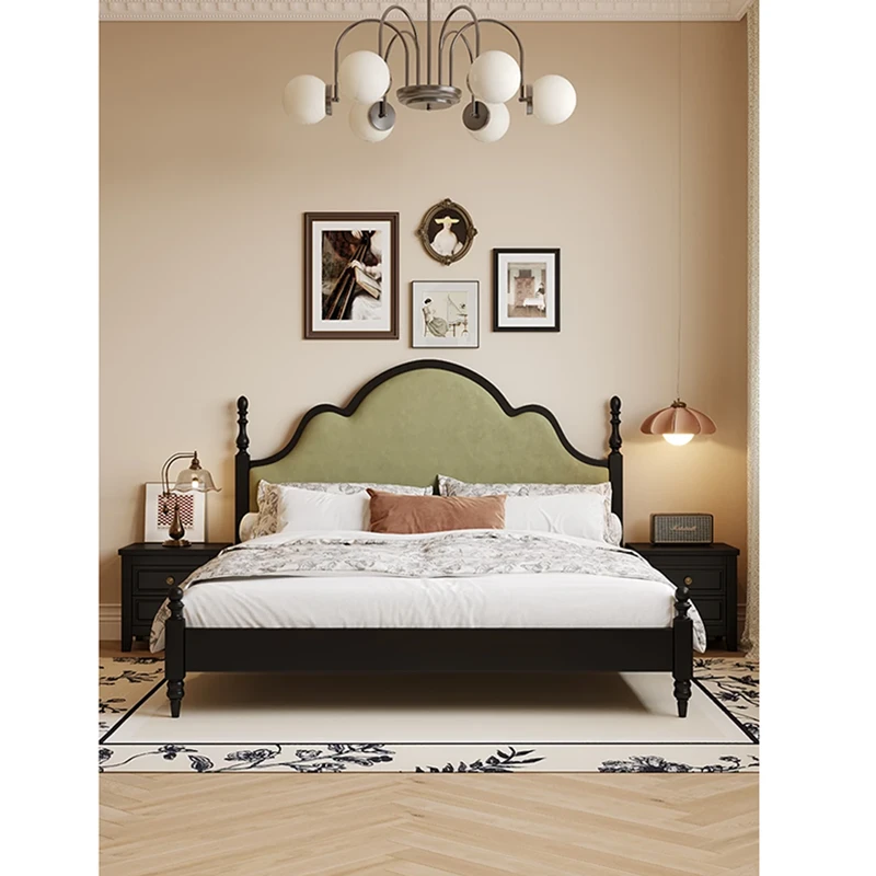 Black bed frame with cream upholstered headboard and slatted base