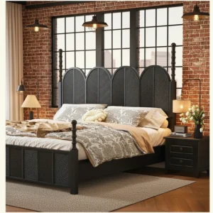 Black poster bed with arched woven rattan headboard in an industrial loft bedroom