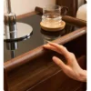 Black walnut nightstand glass top edge close-up detail with tempered glass