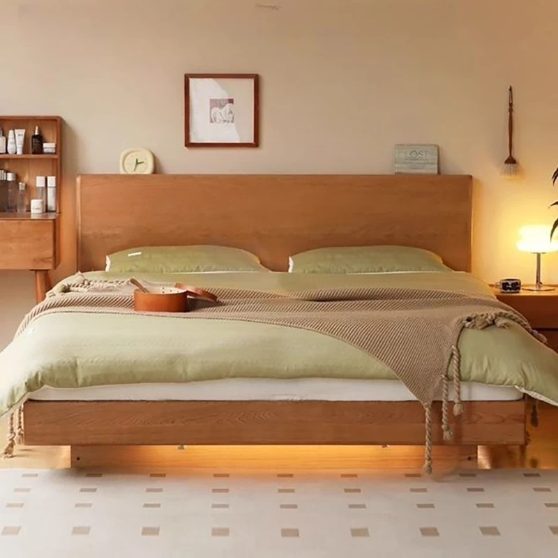 Cherry wood bed with ambient underglow light along the platform base