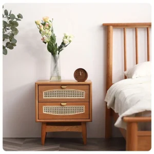 Cherry wood nightstand with bedside lamp in a warm bedroom scene
