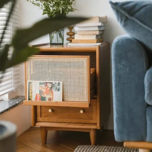 Cherry wood rattan door nightstand in a cozy bedroom lifestyle scene