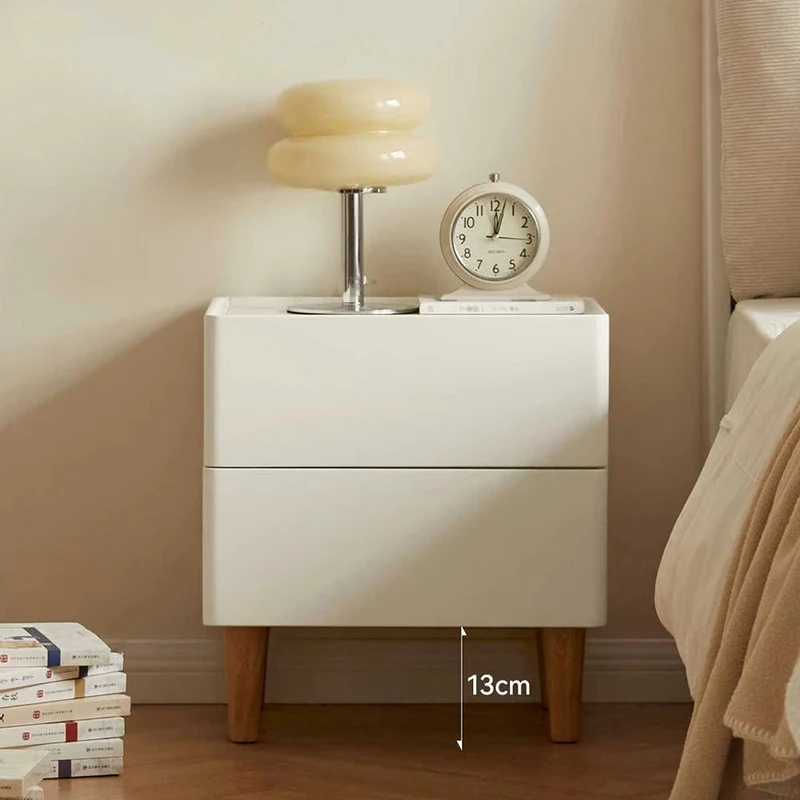 Cream nightstand solid wood legs and height detail with tapered feet