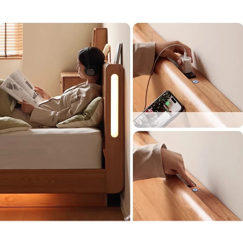 Headboard reading light with USB charging port detail on a cherry bed