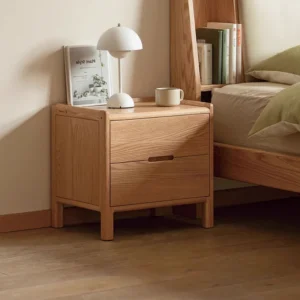 Natural oak 2 drawer nightstand in a cozy bedroom lifestyle scene