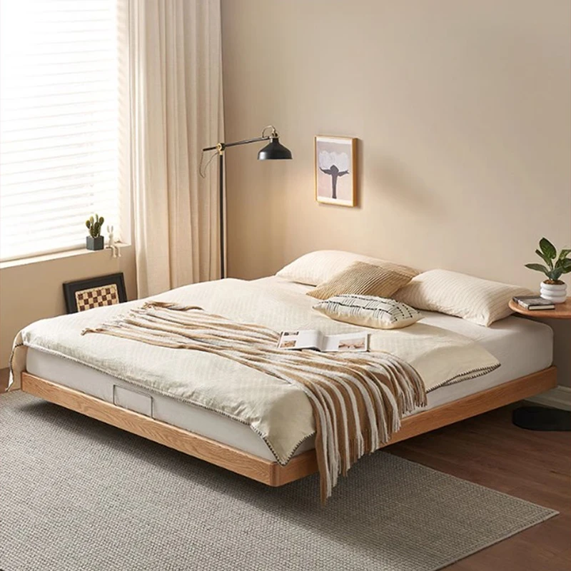 Natural oak floating platform bed with soft bedding in a serene bedroom