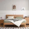 natural-oak-platform-bed-frame-master-bedroom Oak platform bed frame with tall headboard styled in a master bedroom
