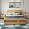 natural-oak-storage-bed-headboard-footboard-shelf Natural oak storage bed with open headboard and footboard shelves in a bright bedroom