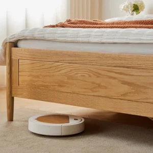 natural-oak-upholstered-headboard-gas-lift-storage-bed Natural oak gas lift storage bed with upholstered headboard in a styled bedroom setting