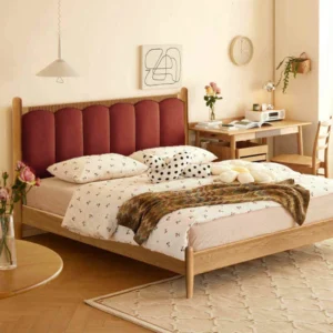 oak-bed-burgundy-upholstered-headboard-scene Oak upholstered bed with burgundy headboard in a warm lifestyle bedroom scene