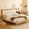 oak-bed-cream-arch-headboard-bedroom-scene Oak platform bed with cream arched upholstered headboard in a bright bedroom scene
