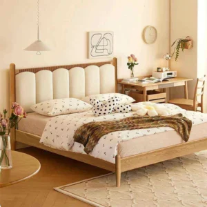oak-bed-cream-arch-headboard-bedroom-scene Oak platform bed with cream arched upholstered headboard in a bright bedroom scene