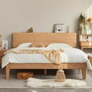Curved headboard platform bed in natural oak styled in a warm bedroom scene