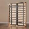 Rear view of oak bed frame slatted base with metal support structure