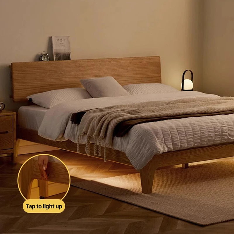 oak-bed-sensor-led-underglow-night Oak bed sensor LED underglow glowing softly at night in a dark bedroom