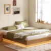 oak-floating-platform-bed-led-light Oak floating platform bed with soft LED base light in a bright modern bedroom