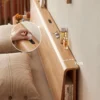 Oak headboard storage ledge with USB charging port detail close up