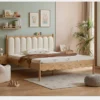 Oak kids platform bed with scalloped upholstered headboard front view