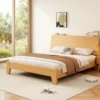 Oak platform bed frame in a bright bedroom scene with garden view window