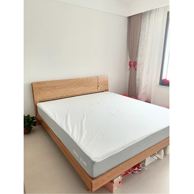 oak-platform-bed-frame-headboard-angle-view Oak platform bed frame headboard angle view showing clean solid wood lines